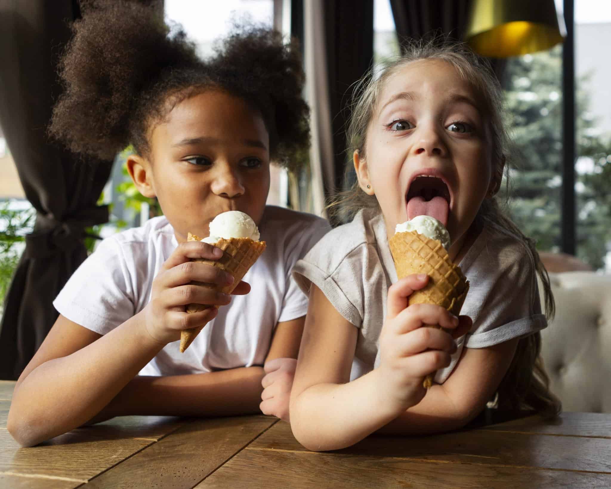 1774707608653_medium shot girls eating ice cream scaled