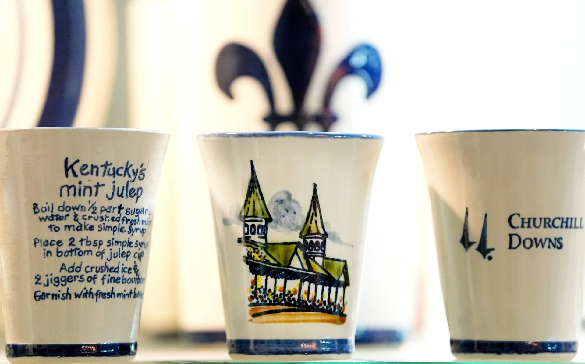 1778077926024_kentuckys mint julep cups with the twin spires on it